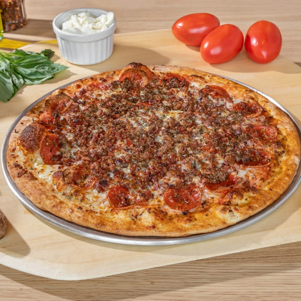 Indulge in Our Meat Lovers Pizza